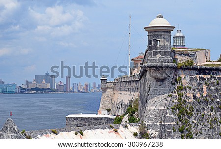 Havana, Cuba: Morro castle and lighthouse with city landmarks in distance