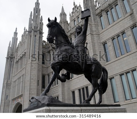 ABERDEEN, SCOTLAND - SEPTEMBER 2015: A statue of Robert I, King of the Scots 1306-1329, stands outside Marischal College. It was placed here when the college became City Council headquarters in 2011.
