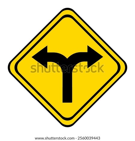 warning road sign on a yellow and black board in the shape of a rhombus. the road forks.