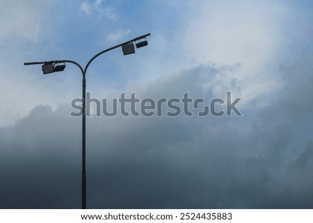 Similar – Image, Stock Photo Lamp before grey sky