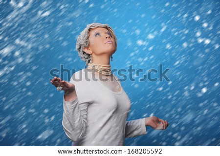winter image of the cold woman removed in studio