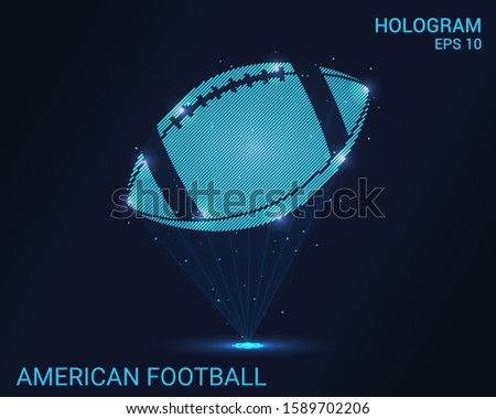 Hologram American football. A holographic projection of the ball for American football. Flickering energy flux of particles. Scientific sports design.