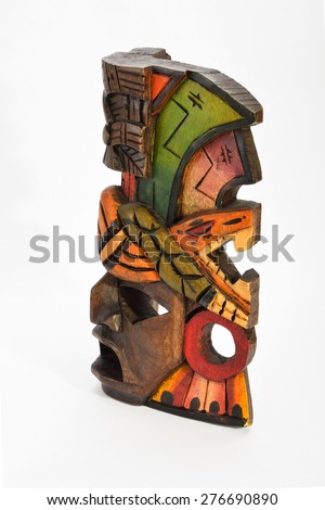 Indian Mayan Aztec wooden mask with anaconda and jaguar isolated on white background (left side view ~ 75 degrees, upper take)