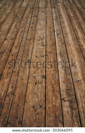 Old vintage rustic aged antique wooden sepia surface with gaps in perspective