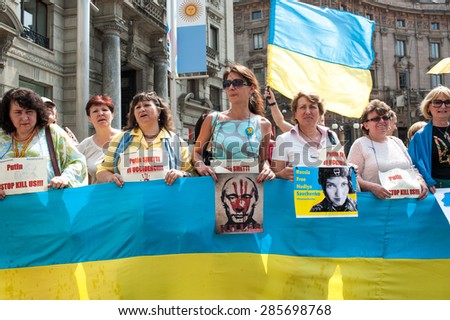 MILAN, JUNE 09, 2015: Ukrainian community protests in Milan against Putin the day before the arrival in Milan of the Russian President for the Russian National Day at Expo.