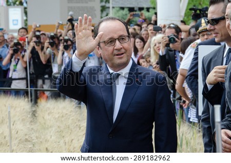 MILAN, JUNE 21, 2015: French President, Francois Hollande, greets his supporters at the entrance of the French pavilion at Expo Milan 2015 on the occasion of the French National Day.