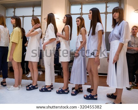 MILANO, SEPTEMBER 23, 2015: Models lined up in the backstage of Chicca Lualdi before going out on the catwalk during the presentation of spring-summer 15/16 collection at Milan Fashion Week 2015