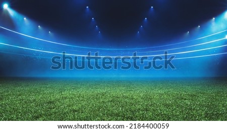 3D Illustration. Digital Football stadium view illuminated by blue spotlights and empty green grass field. Sport theme digital 3D background advertisement illustration design template Foto stock © 