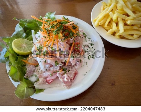 Similar – Image, Stock Photo Raw fish with lemon and herbs