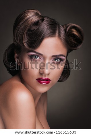 portrait of young woman with make up and coiffure