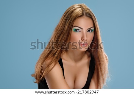 Suntan Woman. Beautiful happy woman. Sun Tanning. blue background