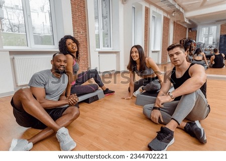 Image, Stock Photo Content ethnic sportswoman resting during training