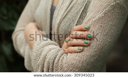 Fold One\'s Arms. Woman cross arms in wool jacket.