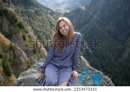 Similar – Image, Stock Photo Smiling woman squinting in sun and enjoying weather