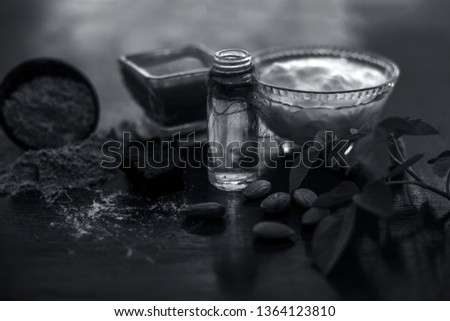 Best hair conditioner on wooden surface of Asafoetida or hing i.e. Hing powder with almond oil and yogurt.Used to get silky smooth hairs. Photo stock © 