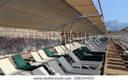 rows of beds on the beach in Turkey/ beach