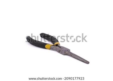 Needle nose pliers or radio pliers with black handle isolated on white. Imagine de stoc © 