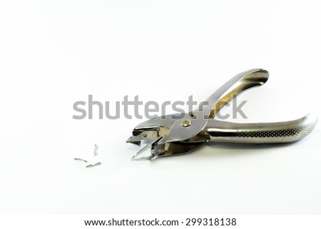 Grey Staple remover with white background