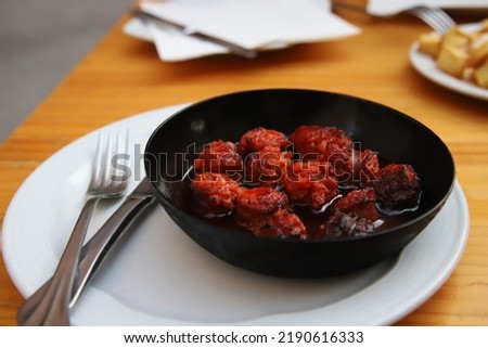 Image, Stock Photo Small pan with choricitos and sauce