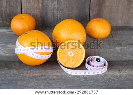 Orange,Fruit concept diet on a wooden floor.