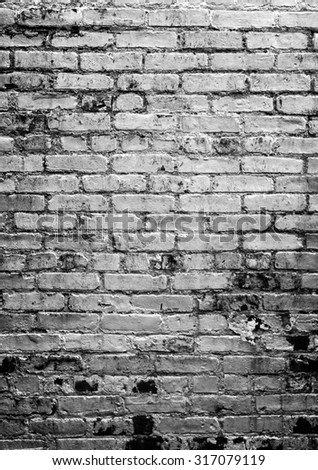 Grungy brick wall, black and white, Vertical, with vignette. Room for text