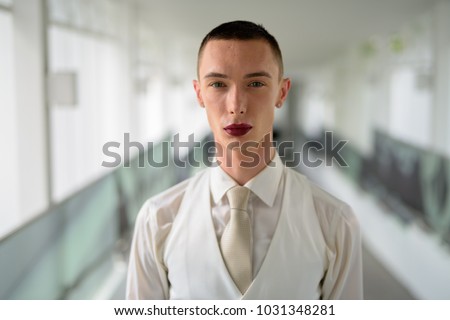 Similar – Image, Stock Photo Eccentric androgynous man in black outfit