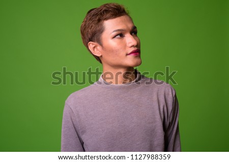 Similar – Image, Stock Photo Eccentric androgynous man in black outfit