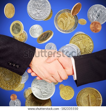 Two businessman hand grip on different money rain background