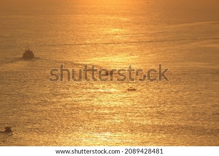 Fisherman boat return home in the sunset - 11 Dec 2021 in Tuen Mum 商業照片 © 