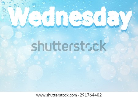 Wednesday cloud message on  water drops bokeh background