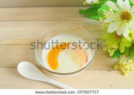 Natural low-fat yogurt mix peach and apple slice