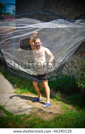 fisherman throwing net