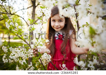 girl near the apple tree flowers