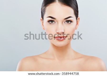 image.shutterstock.com/display_pic_with_logo/3179588/358944758/stock-photo-young-girl-with-big-eyes-and-dark-eyebrows-with-naked-shoulders-looking-at-camera-and-smiling-a-358944758.jpg