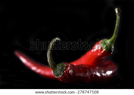 Red chili, chili on black background