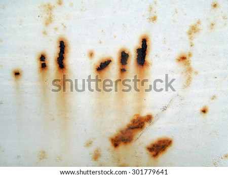Background of rusty metal wall white covered with paint peeling