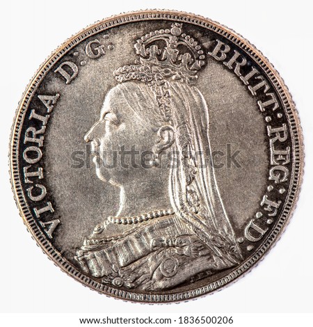 United Kingdom A coin commemorating featuring a portrait of Queen Victoria British Silver 'Jubilee Head'. Crown Coin. Crowned Victoria left Legend: VICTORIA D:G: BRITT:REG:F:D:Years: 1890 Coins. Stock fotó © 