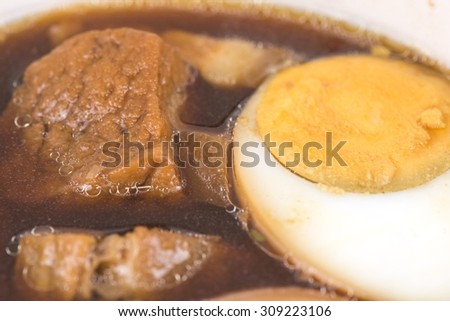 Eggs,tofu and pork in five spices brown sauce