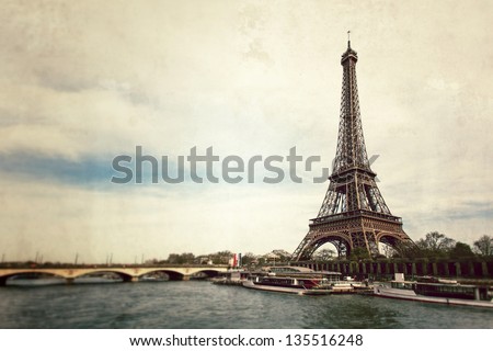 Vintage view of Eiffel tower from Seine river - Paris - France