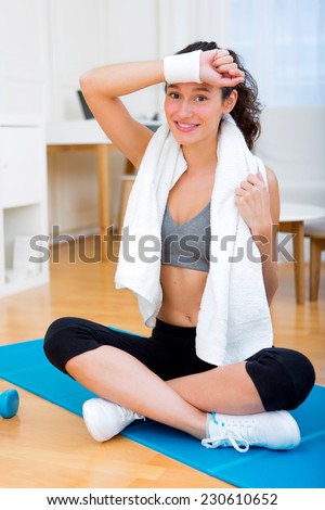 View of an attractive girl having rest after sport