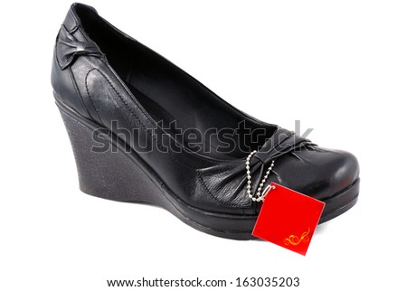 Black rigorous high heels for formal events. Shoes on a white background.