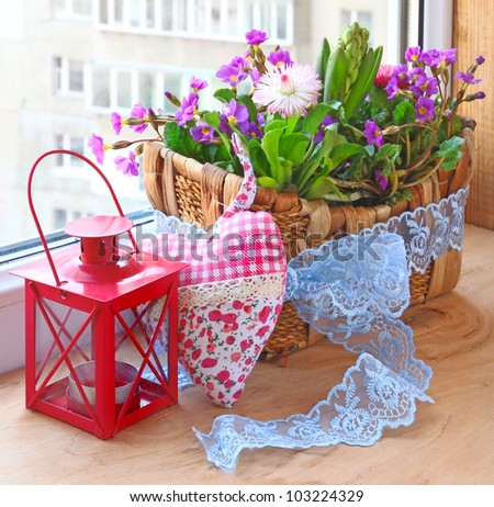 Decoration of balcony hyacinths bellis and primrose Spring flowers on a balcony