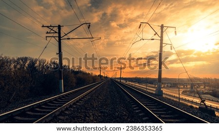 Similar – Image, Stock Photo Sunset turning rail track into golden path