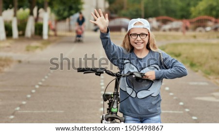 Similar – Image, Stock Photo 11 Cyclists ride one after the other on a dam