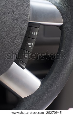 The commands on a steering wheel for cruise control