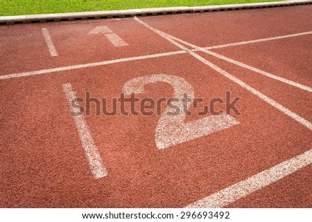 Starting Line of Track Running Lanes in sport stadium