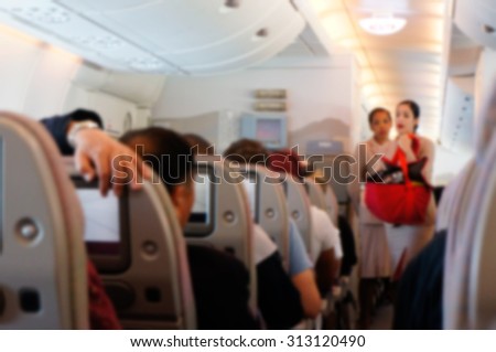 Blurred background of  interior aircraft , luggage cabin .