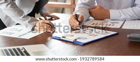 Business and Financial concept. Business team discussing assessment and evaluation of corporate showing the results of their successful teamwork. Stockfoto © 