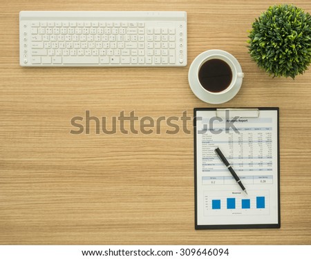 Office table with keyboard computer and report. top view and free space for text.