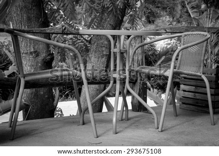 Table and chairs in black and white